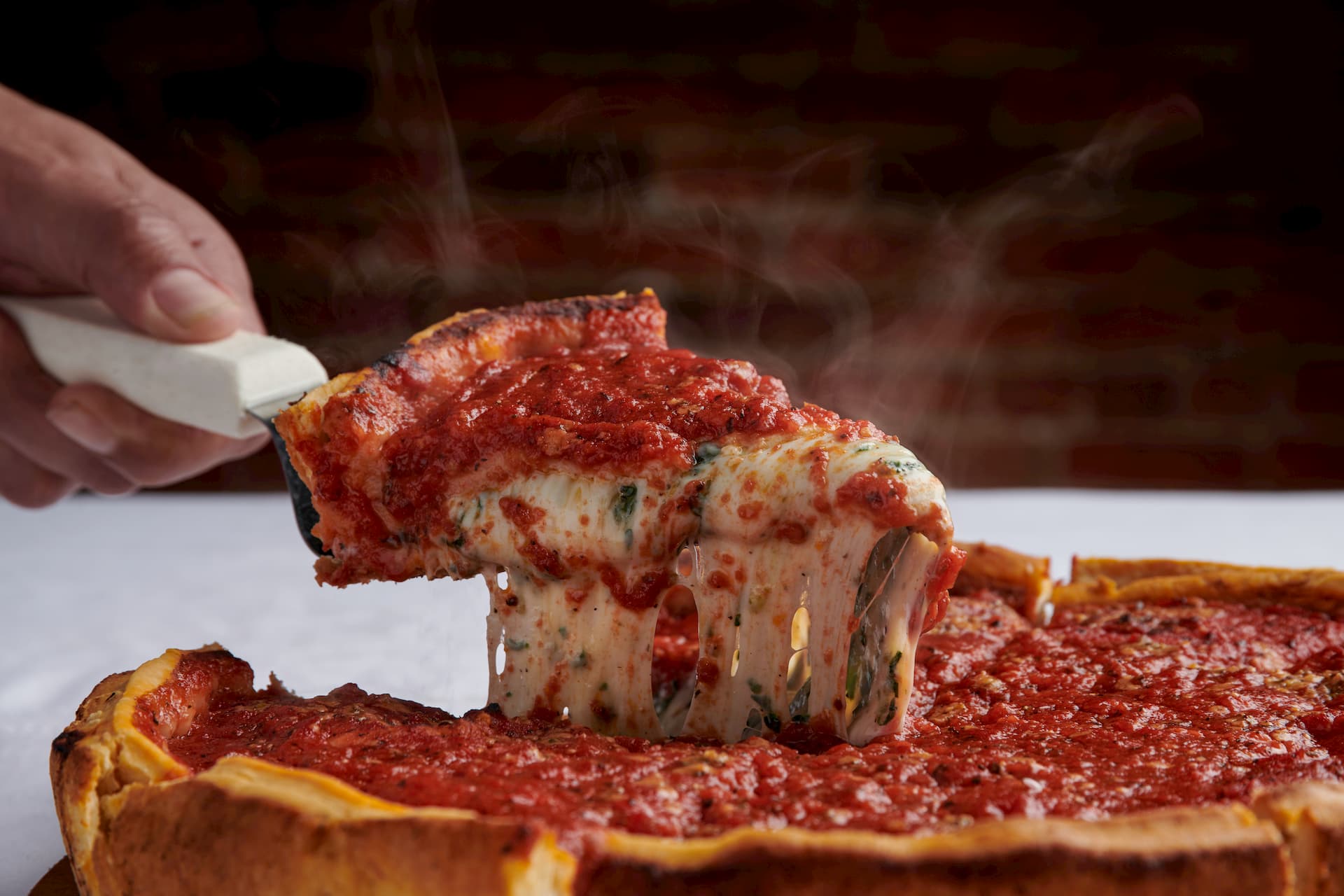 Loaded Deep Dish Pizza with Sausage & Peppers